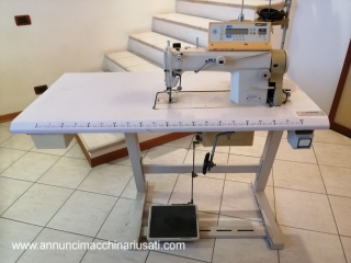 Professional industrial linear lockstitch sewing machine for medium-light materials.